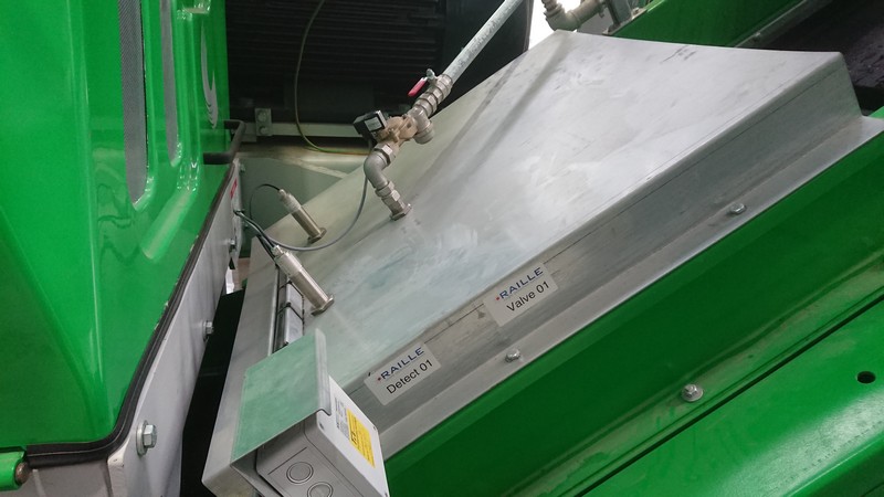 ember detectors and extinguisher in conveyor -  part of an industrial fire protection solution